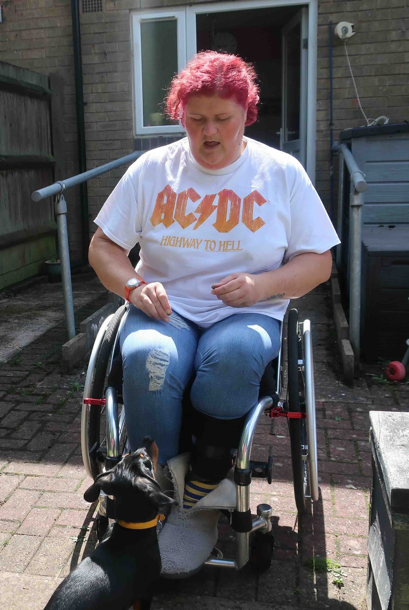 Lady playing with dog